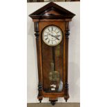 Vienna wall clock in walnut and ebonised case, with single weight,