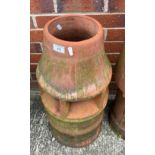 A terracotta chimney pot (cracked),
