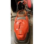 A Flymo Vision Compact 240v rotary lawn mower with Easi-reel tangle free cable storage (failed test