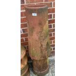 A terracotta chimney pot,