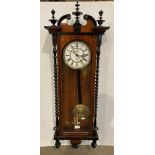 Vienna wall clock in walnut and ebonised case with single weight,