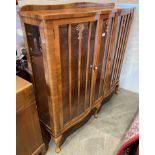 Walnut glass fronted china cabinet with double glazed doors, on cabriole legs,