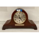 Mahogany mantel clock with round face and presentation plaque, with seven bell chime, no.