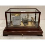 O Comitti & Sons, London barograph, in mahogany and brass case,