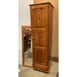 Pine single door wardrobe with under drawer, 49cm x 182cm high and a pine framed mirror, 134cm x 42.