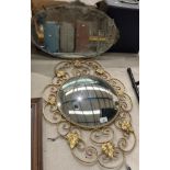 Two wall mirrors - one brass framed 73 x 48cm and one oval 36 x 56cm (saleroom location: S3 T5)