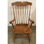 Oak and wooden high back rocking armchair with spindle back (Saleroom location: MW)