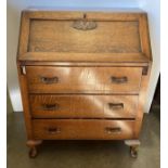 Oak bureau with fall front and three drawers,