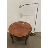 Burr walnut circular coffee table on cabriole legs and a brass effect adjustable standard lamp