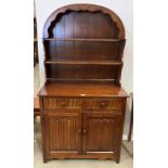 Dark oak Old Charm Dutch dresser with a two tier plate rack over a two drawer,
