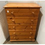 Modern pine five drawer chest of drawers, 69.