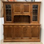 A large oak dresser/wall unit by Albert Oldroyd of Cawthorne,