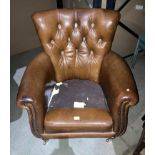 Brown leather button back armchair (no seat cushion) (Saleroom location: Kit)