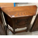 An Old Charm oak single door shaped low cabinet,
