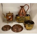 A copper half gallon jug, a copper and brass kettle on stand, two copper draining bowls,