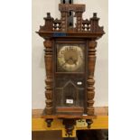Mahogany and walnut finish Vienna wall clock with pendulum,