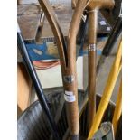 Eight garden tools including bow saw, Wilkinson Sword hedge clippers, rake, lawn edgers etc...