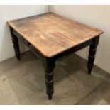 A pine kitchen table with single drawer, on turned legs,