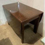 Oak drop leaf dining table,