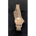 9ct gold "Omega" "Ladymatic" ladies' wrist watch with a 9ct gold chain strap, 1960s.