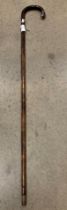Dark stained walking cane with silver mount hallmarked 1915,