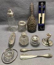 Twelve assorted silver [hallmarked] items including a hair brush, sugar shaker,