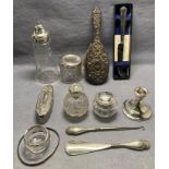 Twelve assorted silver [hallmarked] items including a hair brush, sugar shaker,