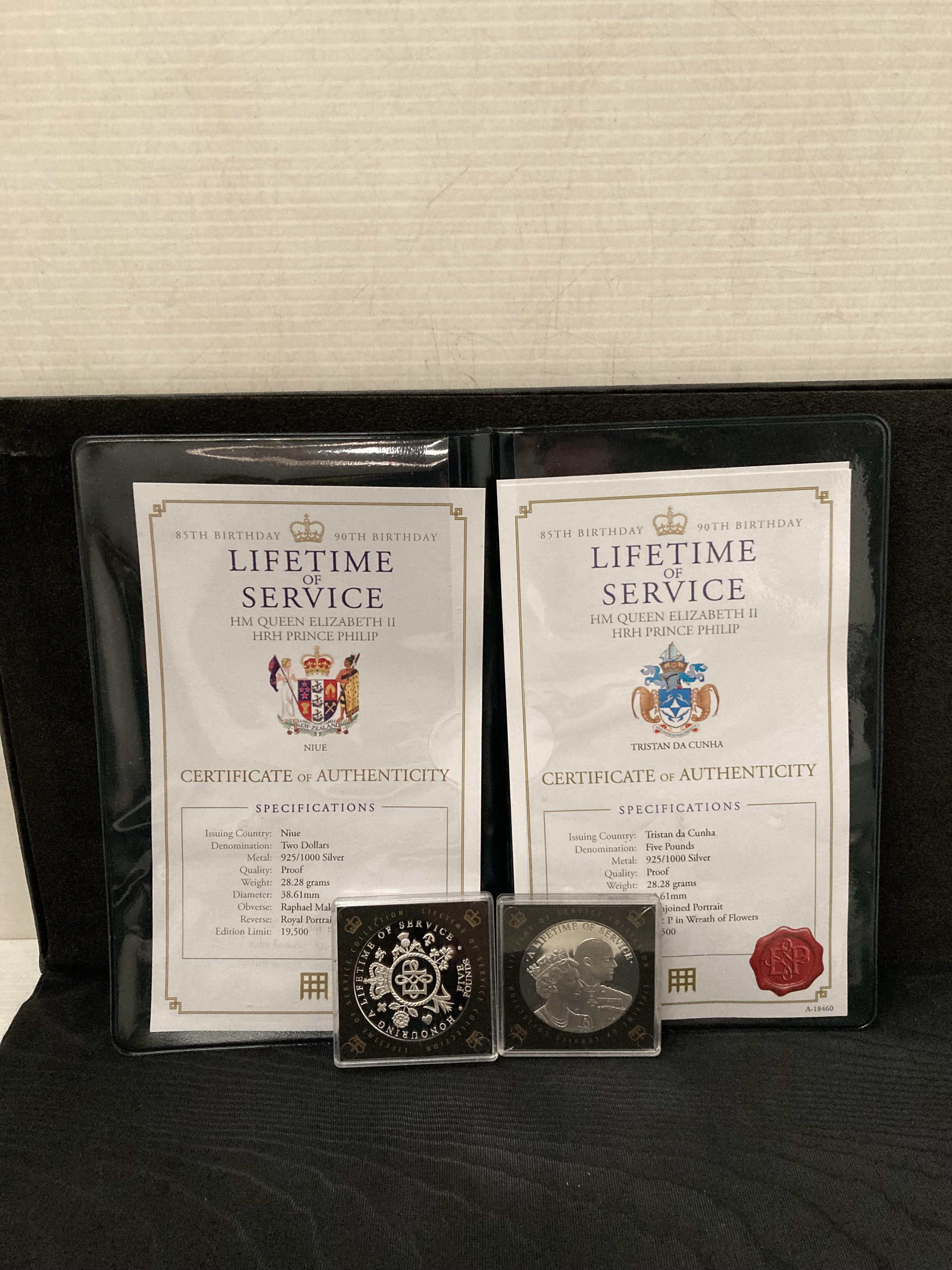 Two Limited Edition Sterling Silver proof coins [stamped: 925] "Lifetime of Service" 85th & 90th