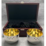 Pair of silver [hallmarked] bowls in display case with silver [hallmarked] plaque by RICHARD O A