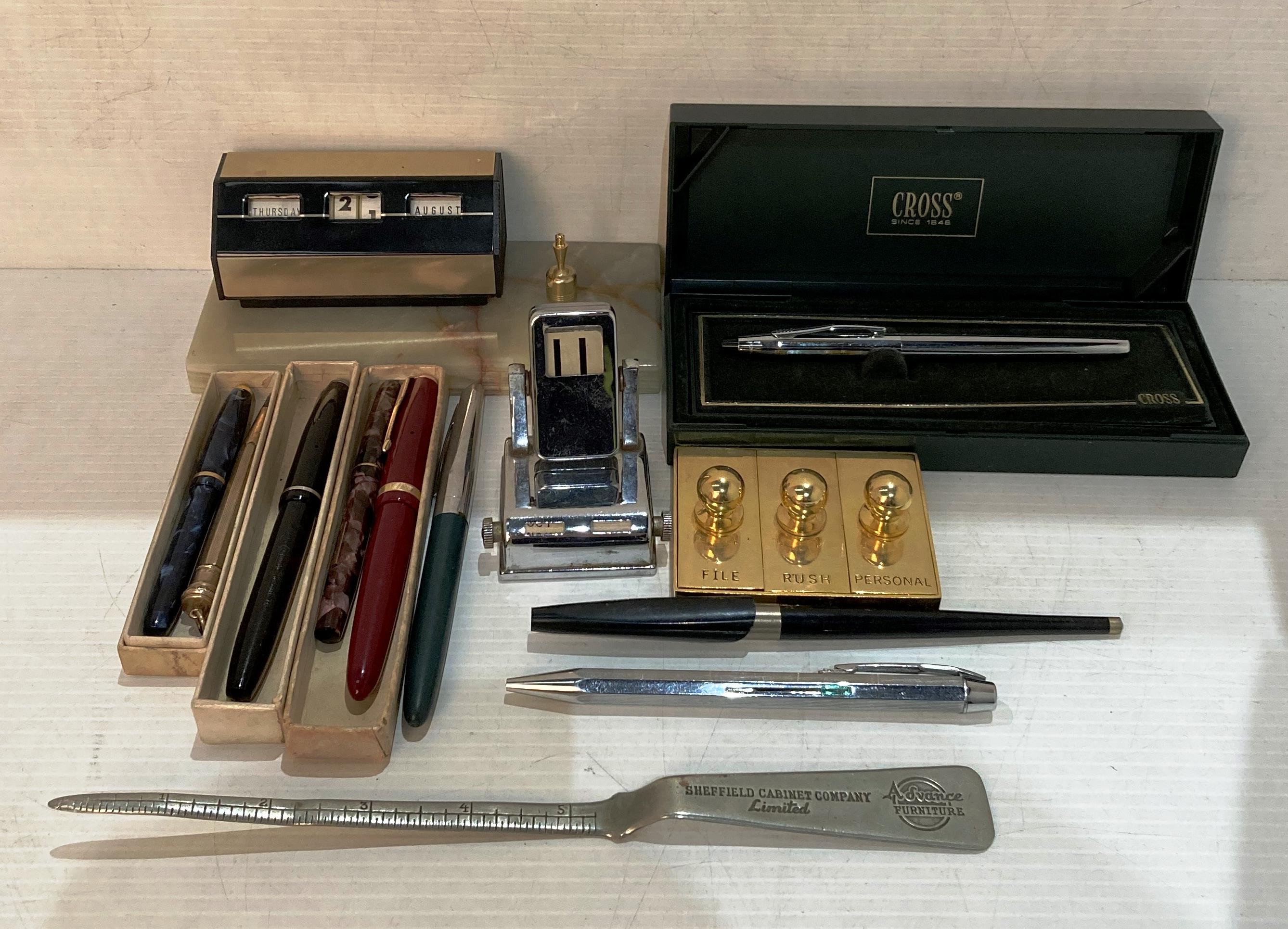 Contents to box - rolled gold propelling pencil, assorted fountain pens, vintage desk-top calendar,