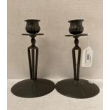 Pair of Tudric pewter candle stick holders,