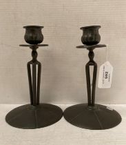 Pair of Tudric pewter candle stick holders,