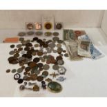 Contents to tin - two commemorative £5 coins, a 1986 £2-coin, assorted crowns,