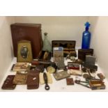 Contents to part of rack - small leather suitcase, grooming kits, cigarette cases,