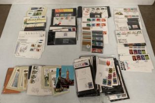 Approximately 170 assorted First Day issues/Mint stamps and postcard issues including 25th