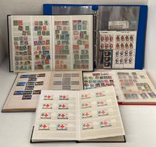 Four books of stamps including Churchill Commonwealth Mint stamps,