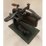 19th Century Crown crimping device in original colours, made from cast iron and brass rollers.