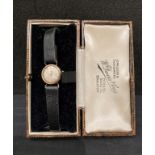 9ct gold TUDOR ROYAL ladies wrist watch with black leather strap. Total weight - 9.
