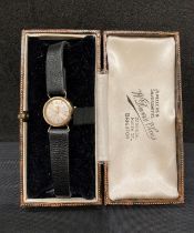 9ct gold TUDOR ROYAL ladies wrist watch with black leather strap. Total weight - 9.