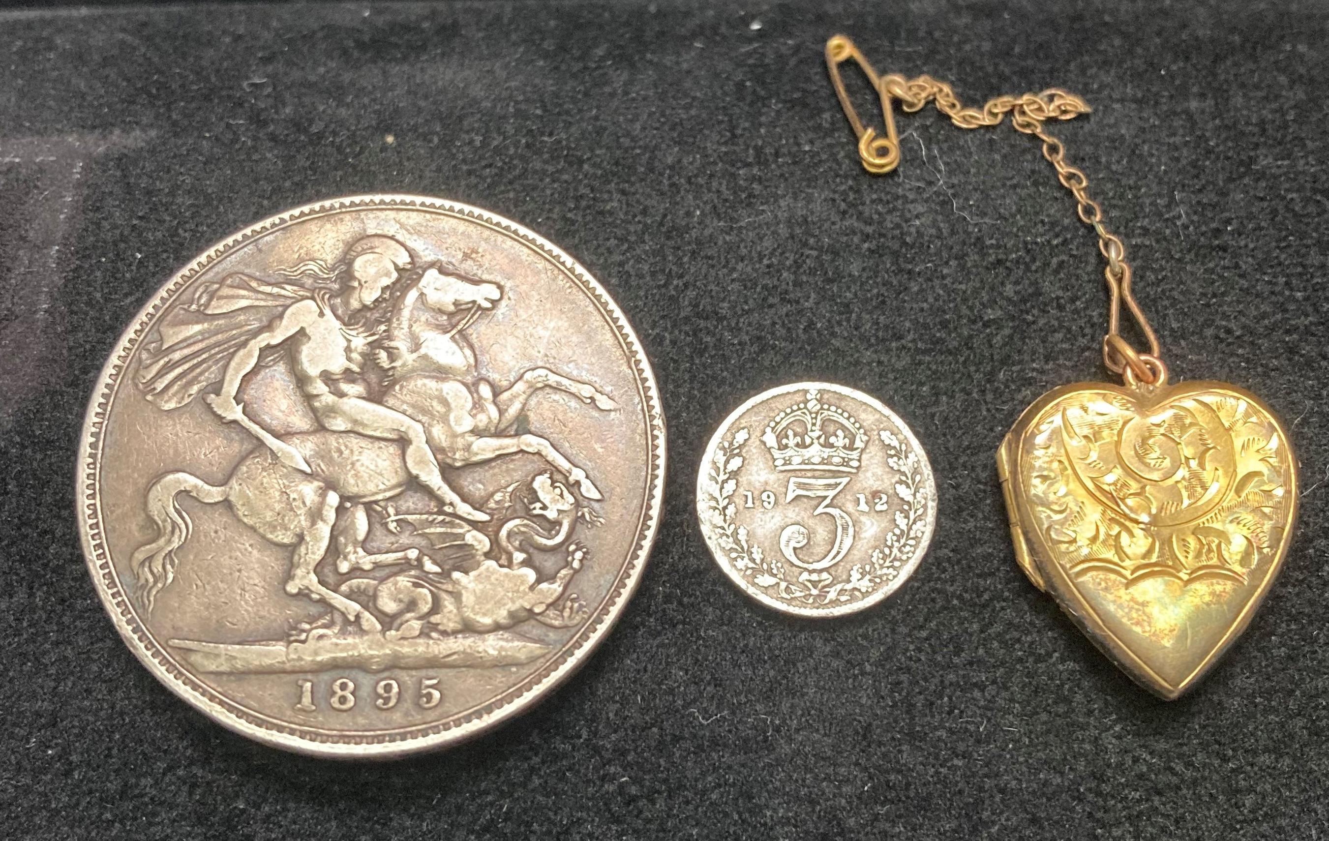 1895 Victoria silver crown and 1912 3 pence and a gold-plated heart locket. Total silver weight - 0.