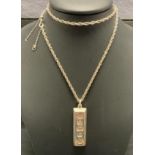 A Sterling Silver .925 Silver Jubilee (Elizabeth II) ingot pendant and a Sterling Silver .