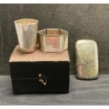 Three silver [hallmarked] items including a silver snuff case engraved with a floral design,