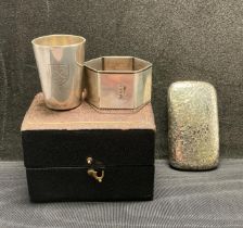 Three silver [hallmarked] items including a silver snuff case engraved with a floral design,