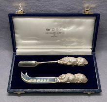 Silver [hallmarked] cheese knife and stilton scoop with double mouse handles by RICHARD JARVIS OF