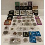 Contents to tub - assorted coins; commemorative crowns, two £2 coins, a 1974 one-dollar,