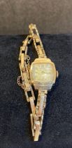9ct gold [stamped: 375] ladies Rotary wrist watch with 9ct gold sprung strap.
