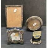 Three assorted size silver picture frames and a silver calendar with date cards (dated 1913)