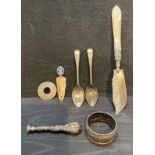 Seven assorted silver items including, an early Victorian scroll,