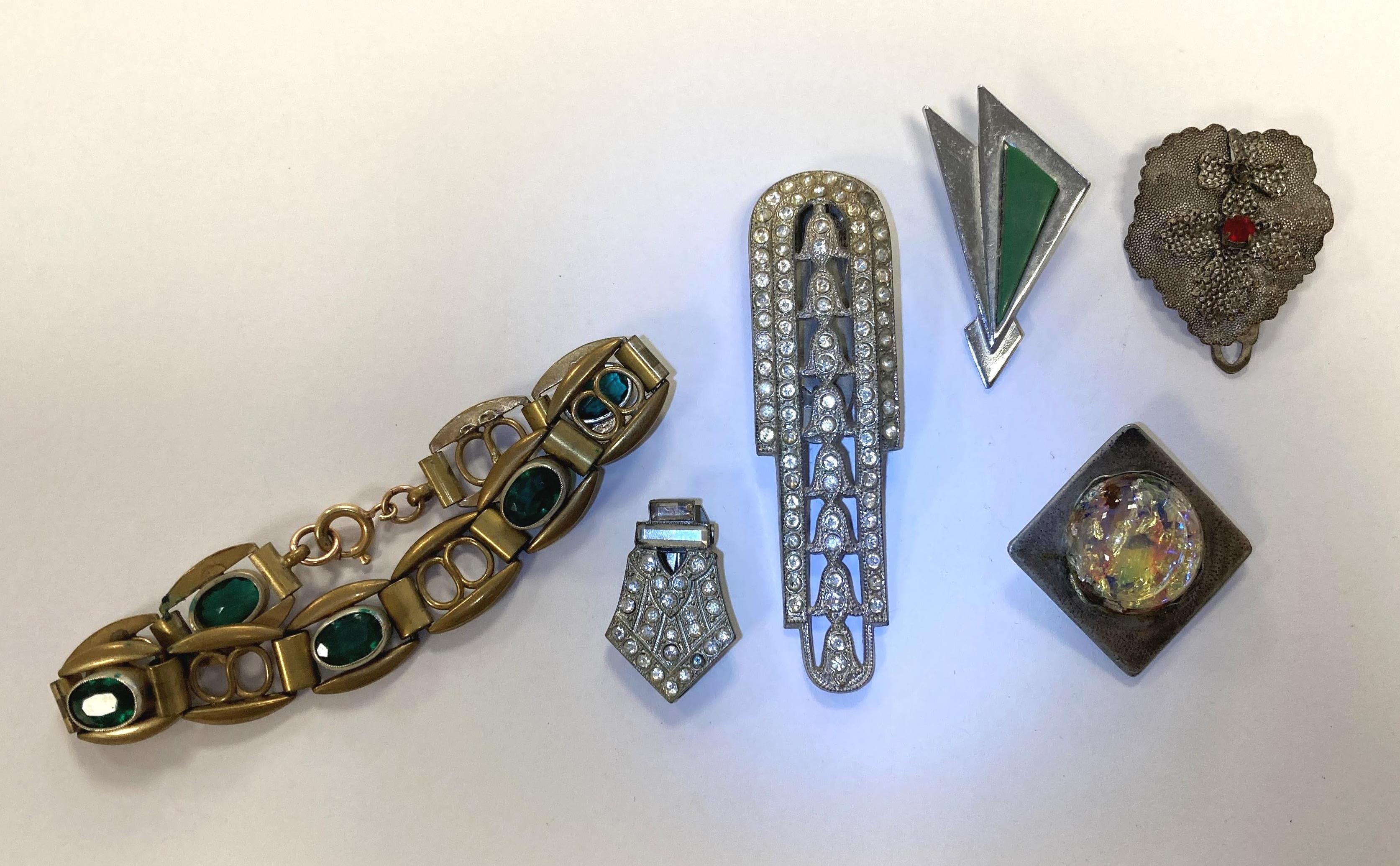 A selection of jewellery mostly from the Art Deco and Arts & Crafts movement.