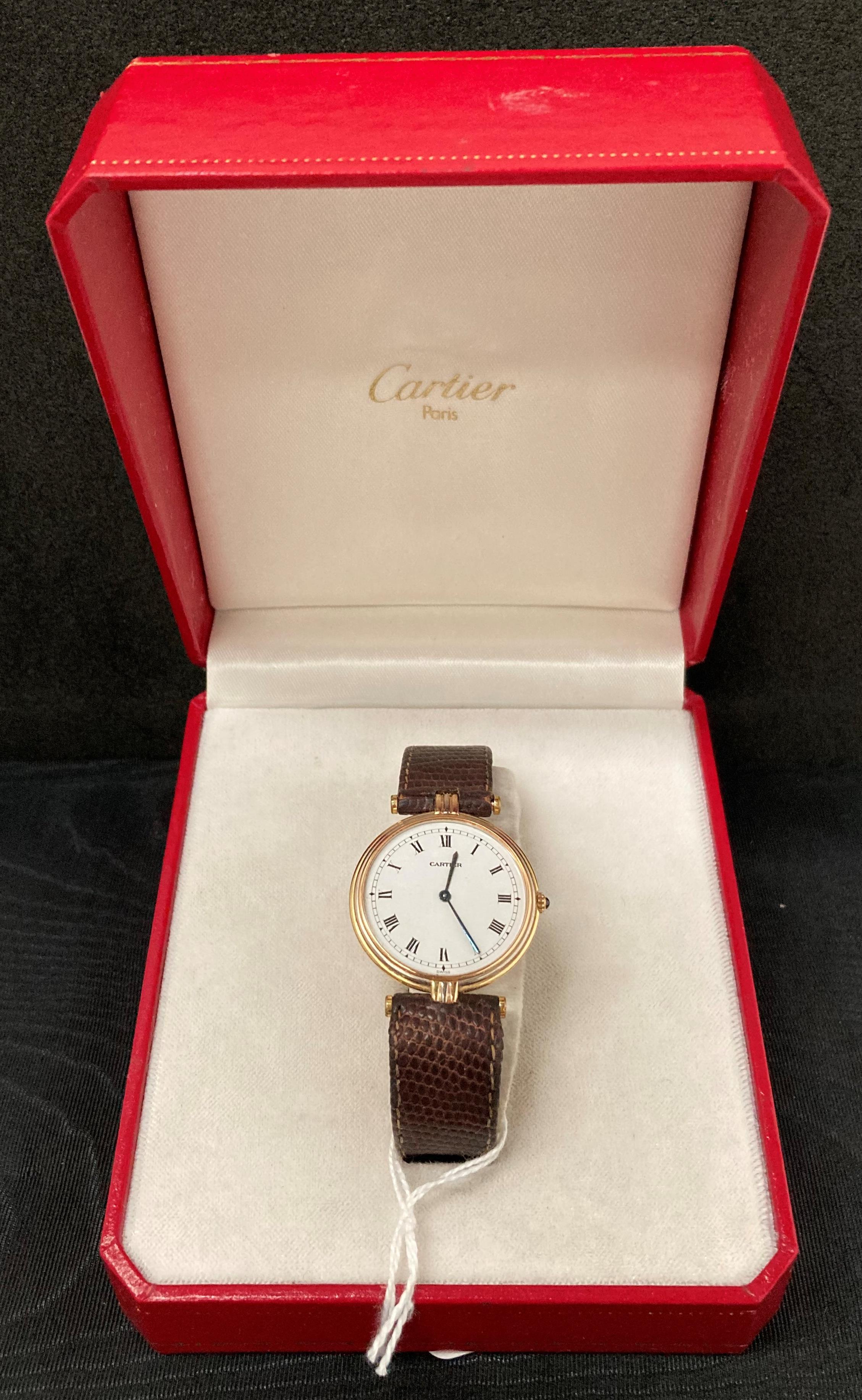 Lady's 18k CARTIER PARIS three colour gold Vendome wristwatch with brown leather strap,